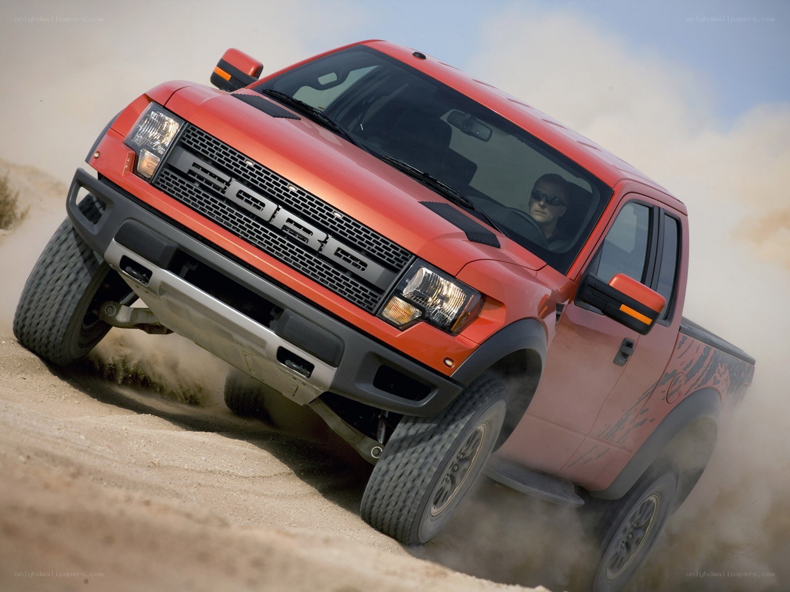 red ford raptor off-roading