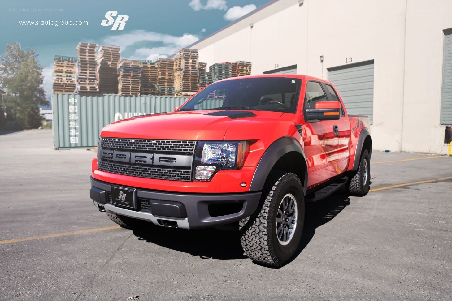 Red Ford Raptor truck