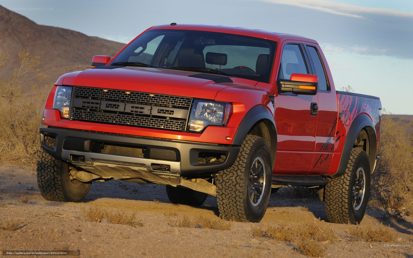 red ford raptor truck