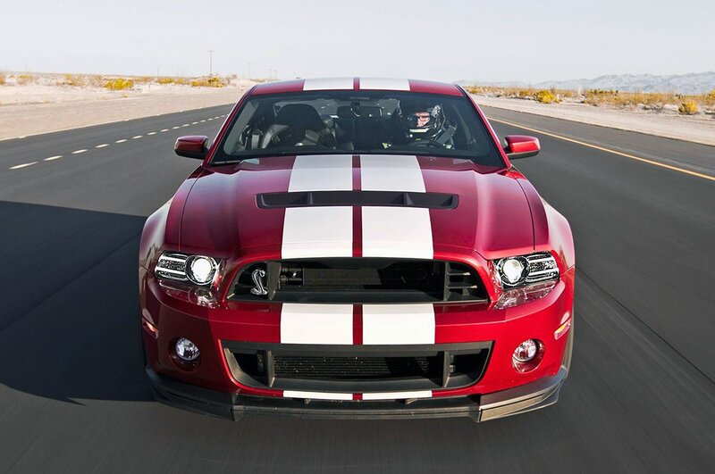 Red Ford Shelby Mustang on road