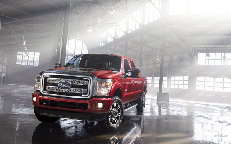 Red Ford Super Duty truck in warehouse