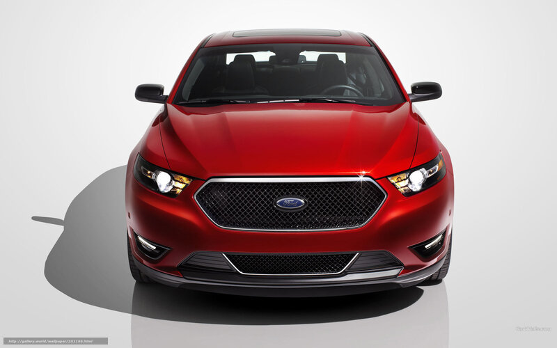 Red Ford Taurus front view