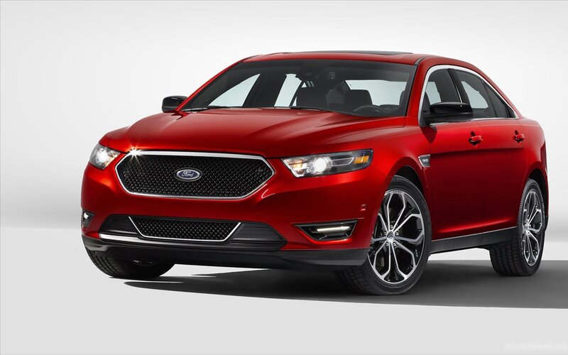 Red Ford Taurus sedan