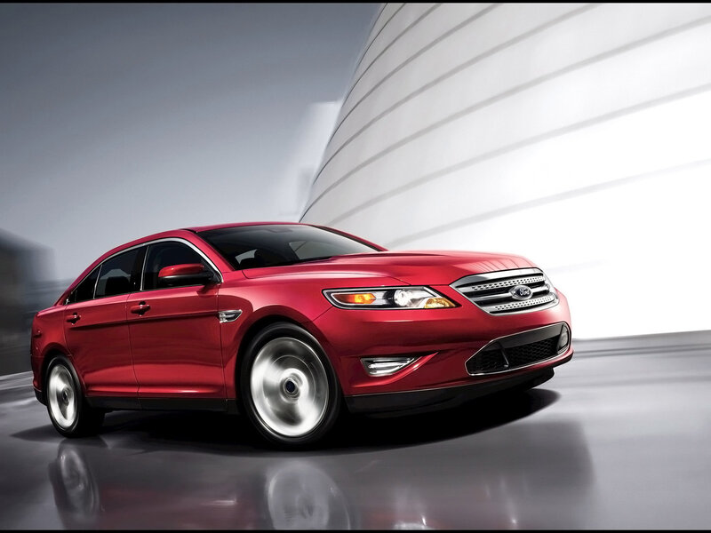 Red Ford Taurus sedan