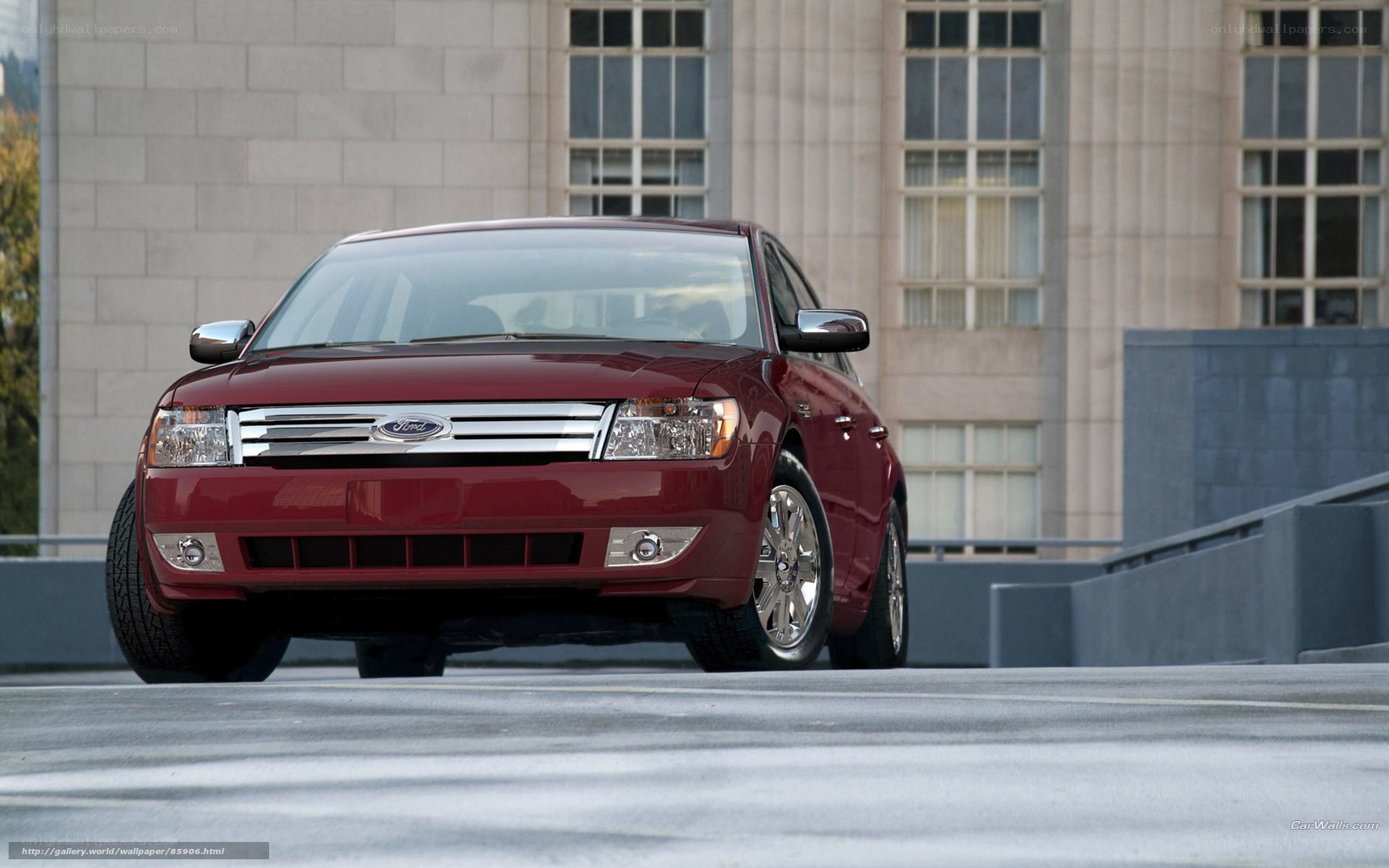 Red Ford Taurus sedan