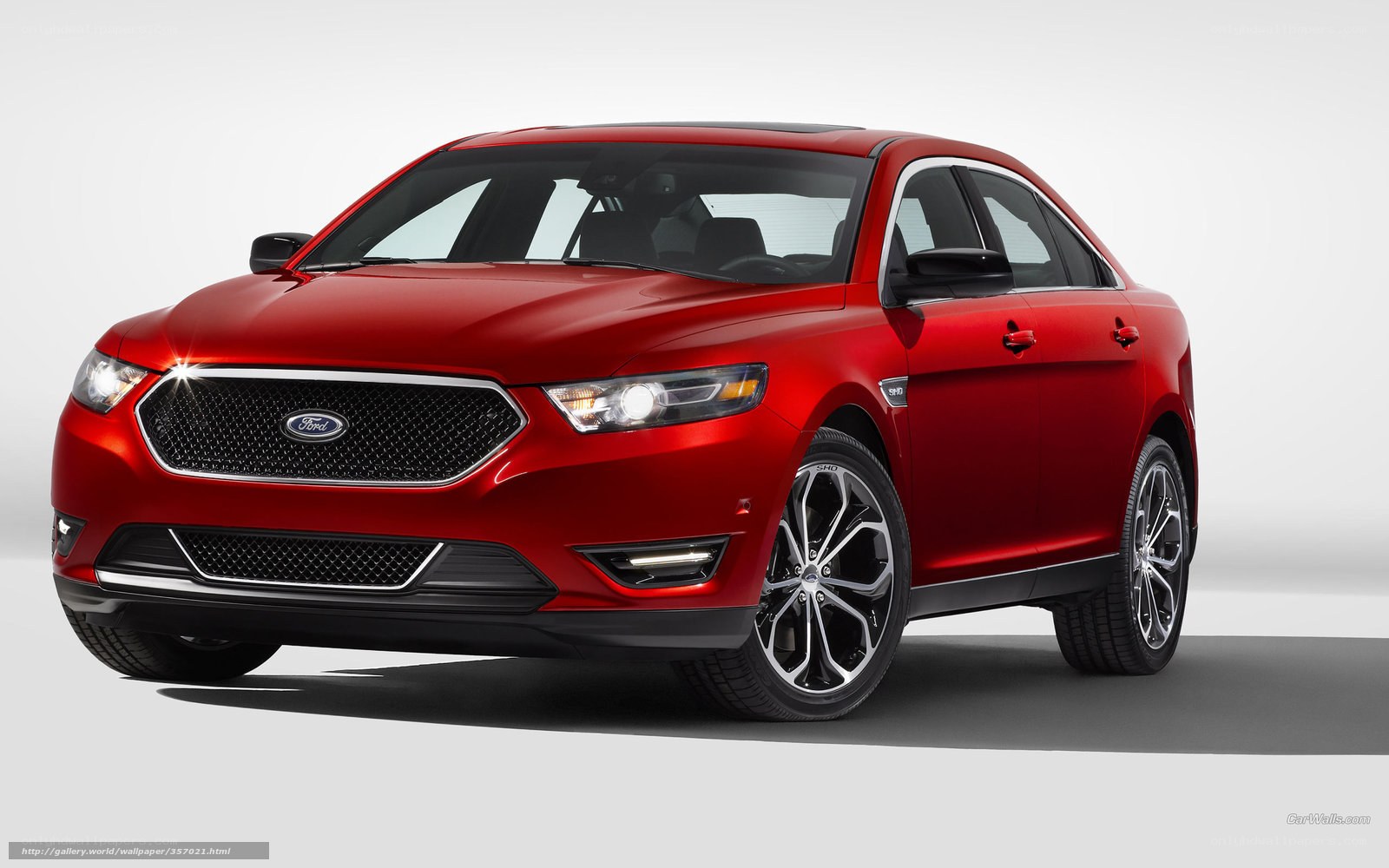 Red Ford Taurus sedan