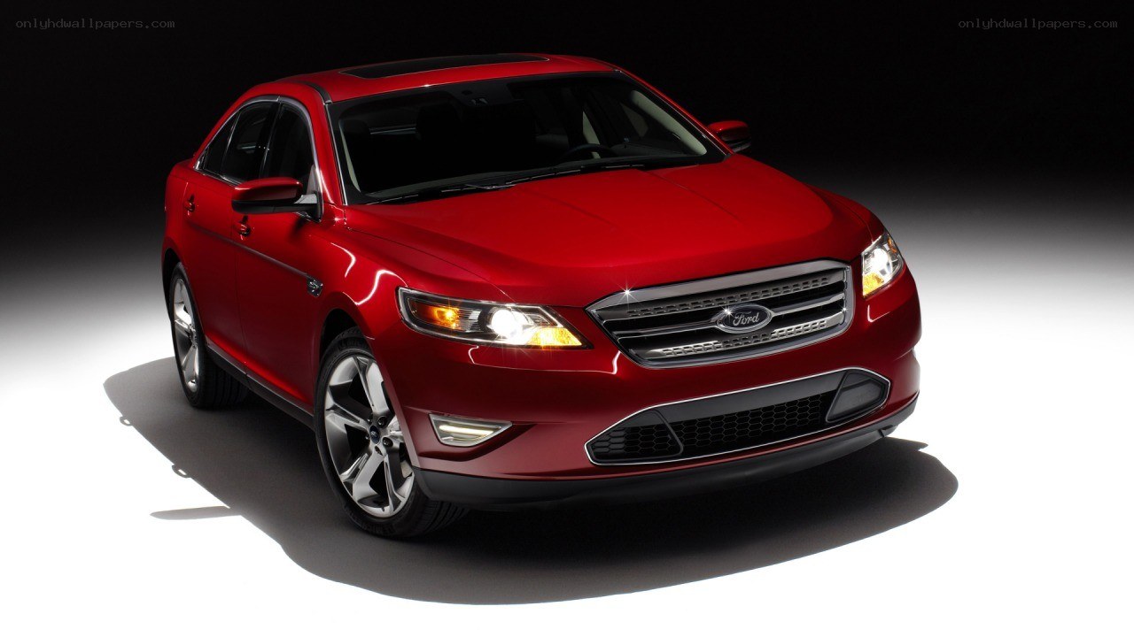 Red Ford Taurus sedan