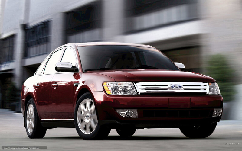 Red Ford Taurus Sedan — Maroon