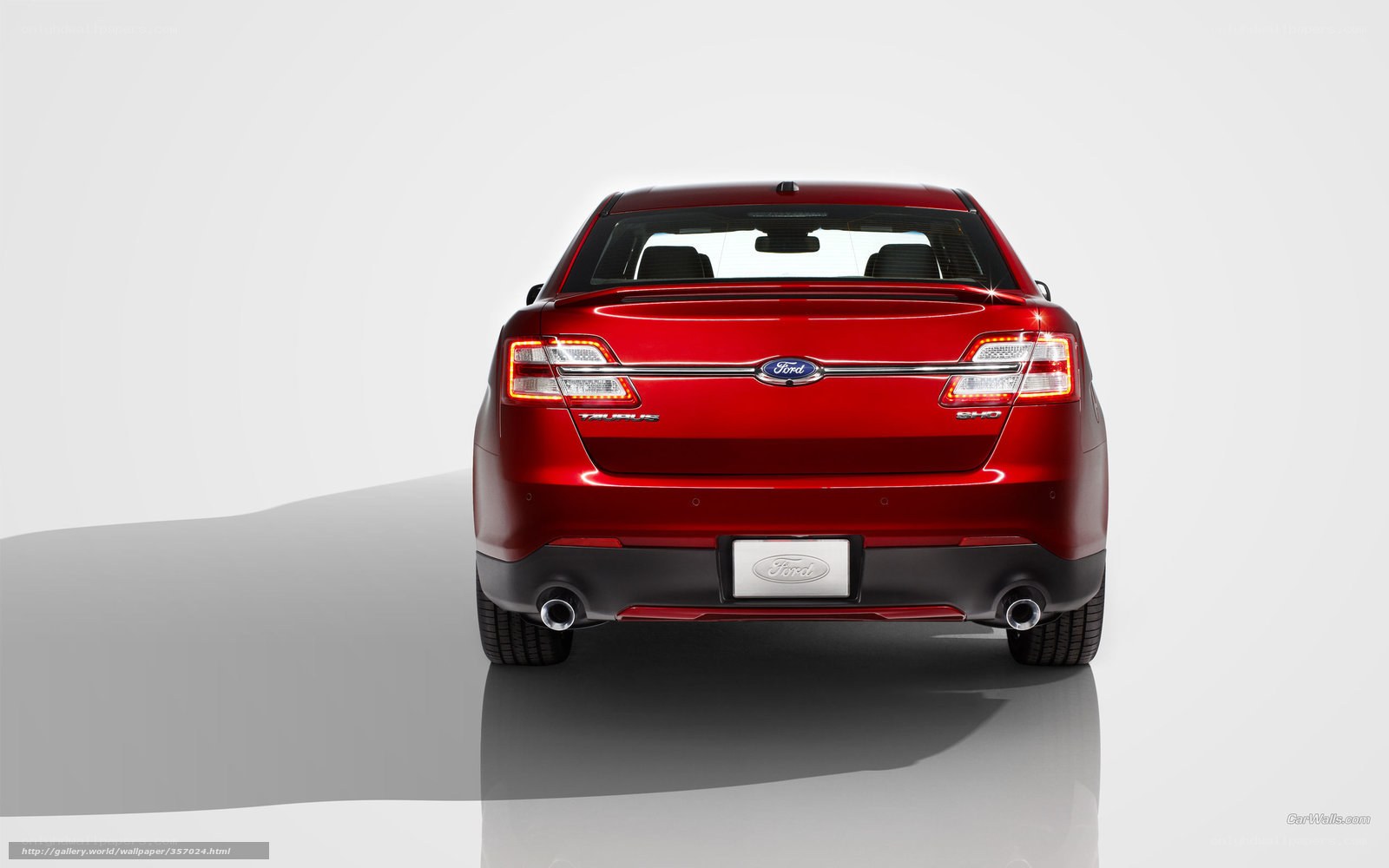 Red Ford Taurus SHO rear view