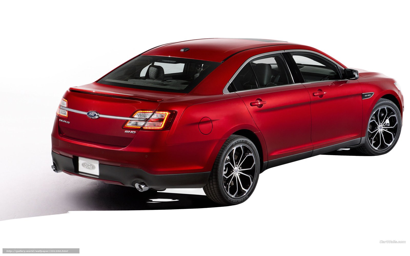 Red Ford Taurus SHO sedan
