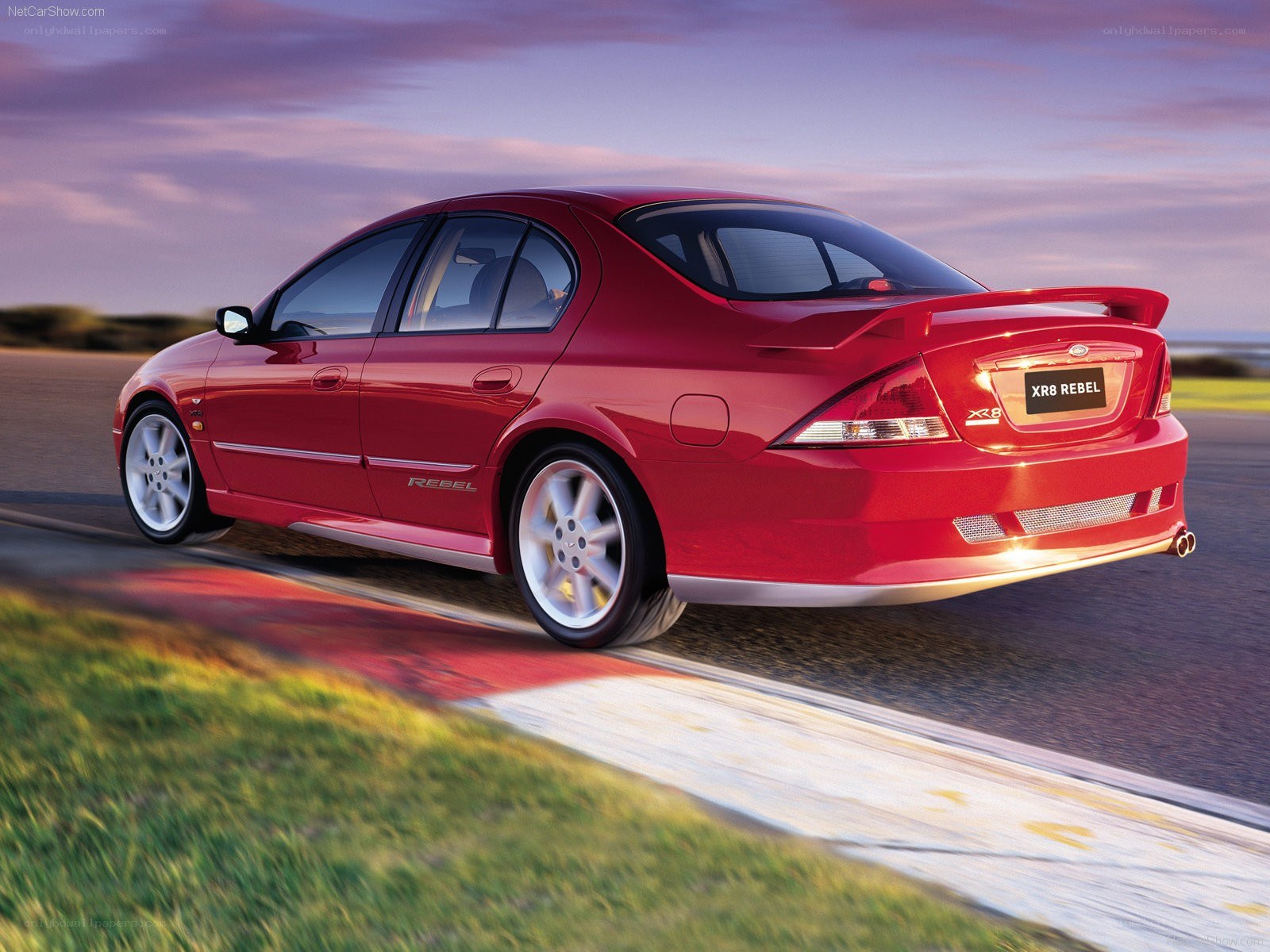 Red Ford XR8 Rebel in motion