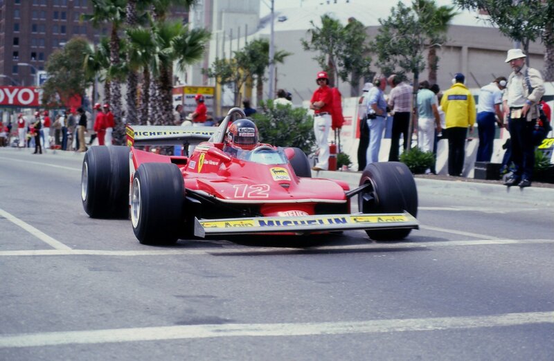 Red Formula One Car — Active, Afternoon, Photograph, Driver, Palm Trees