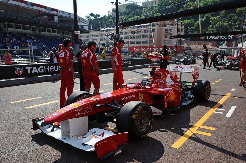 Red Formula One Car — Active, Afternoon, Photograph, Pit Crew