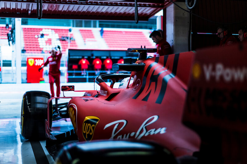 Red Formula One Car — Dramatic, Photograph, Pit Crew