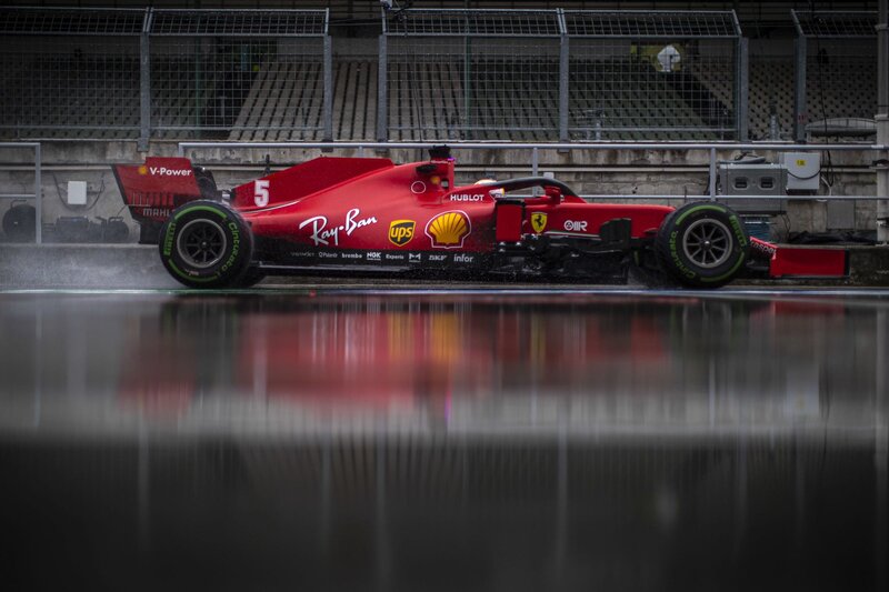 Red Formula One Car — Dramatic, Photograph, Race Track