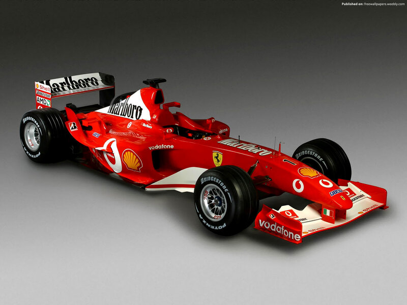 Red Formula One Car — Dramatic, Photograph, Sponsor Logos