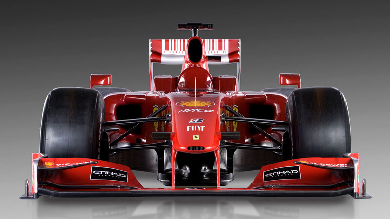 Red Formula One Car — Dramatic, Photograph, Tires, Sponsors