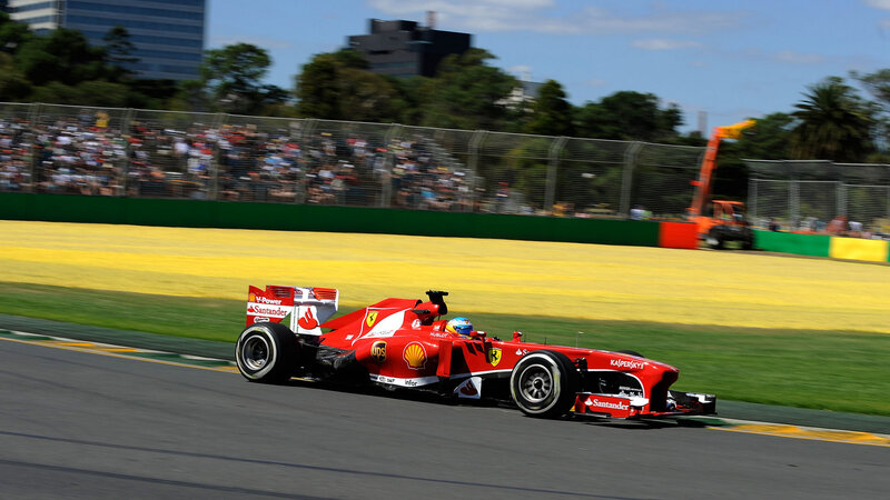 Red Formula One Car — Dynamic, Afternoon, Photograph, Crowd, Fence