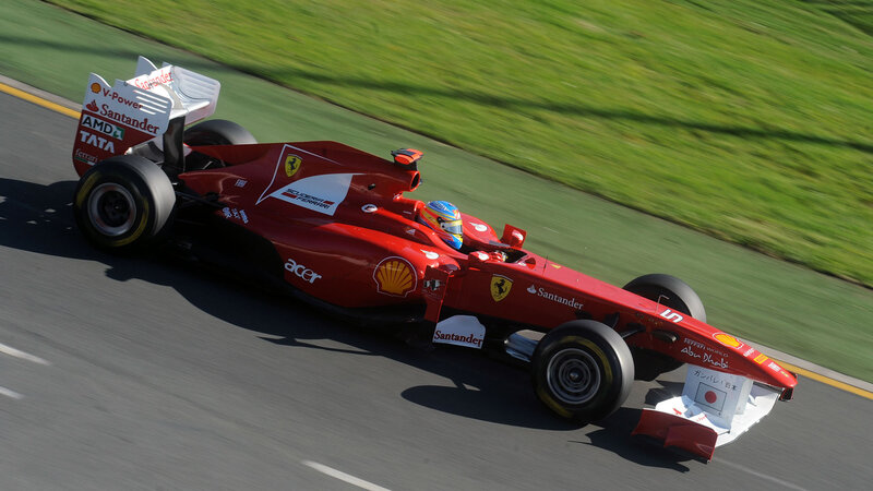 Red Formula One Car — Dynamic, Afternoon, Photograph, Driver, Grass