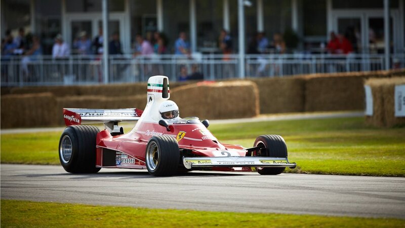 Red Formula One Car — Dynamic, Afternoon, Photograph, Driver, Race Track, Hay Bales
