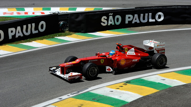 Red Formula One Car — Dynamic, Afternoon, Photograph, Driver, Race Track, Safety Barrier