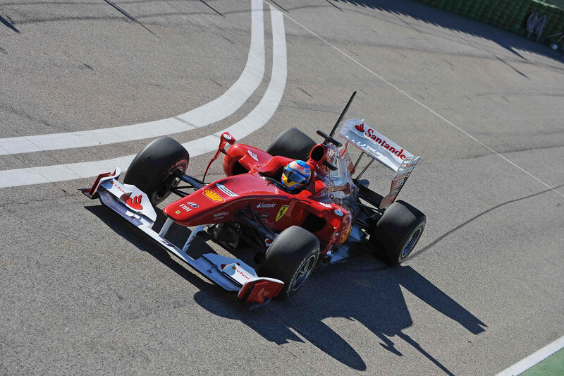 Red Formula One Car — Dynamic, Afternoon, Photograph, Driver, Race Track, Santander, White