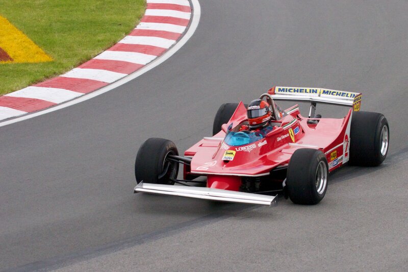 Red Formula One Car — Dynamic, Afternoon, Photograph, Driver, Race Track
