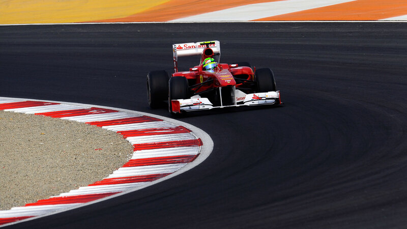 Red Formula One Car — Dynamic, Afternoon, Photograph, Driver, Racetrack, Curb