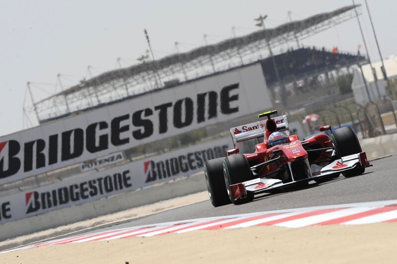 Red Formula One Car — Dynamic, Afternoon, Photograph, Driver, Racetrack