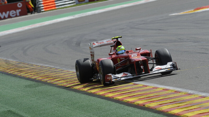Red Formula One Car — Dynamic, Afternoon, Photograph, Driver, Racetrack, Tire Marks