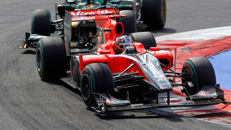 Red Formula One Car — Dynamic, Afternoon, Photograph, Driver, Racing Track, Other Car