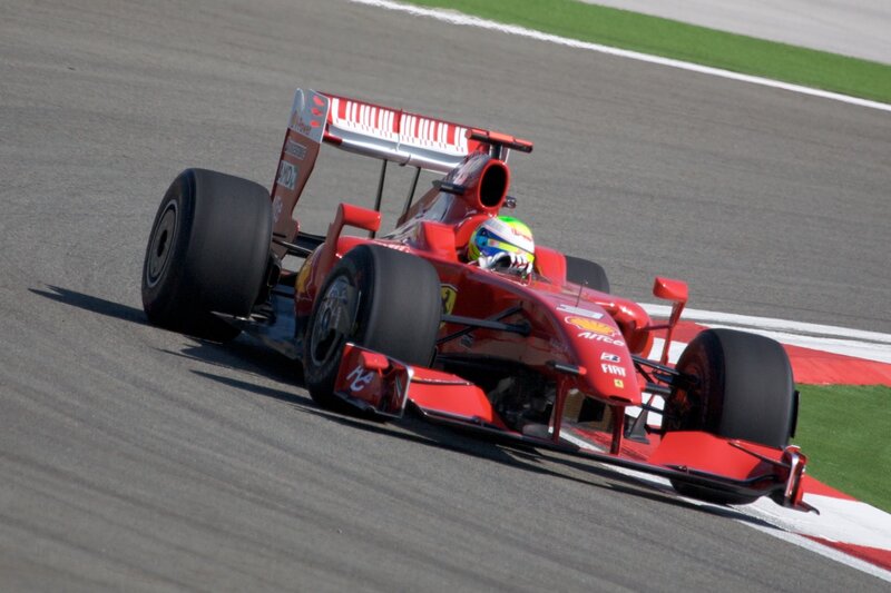 Red Formula One Car — Dynamic, Afternoon, Photograph, Driver, Racing Track