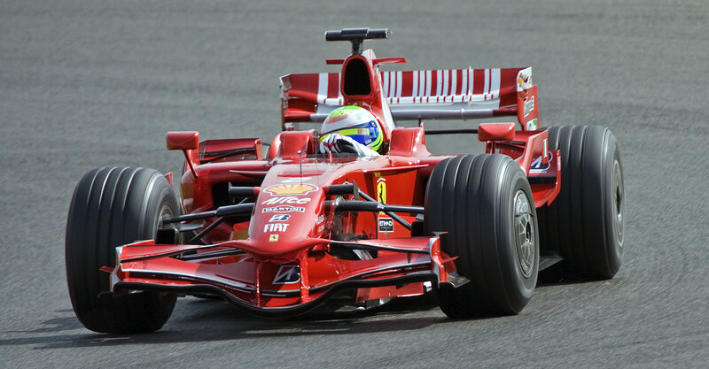Red Formula One Car — Dynamic, Afternoon, Photograph, Driver, Racing Track, Tires, Black, White