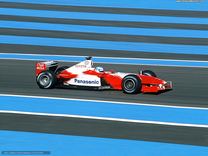 Red Formula One Car — Dynamic, Afternoon, Photograph, Driver, Track, Blue Stripes