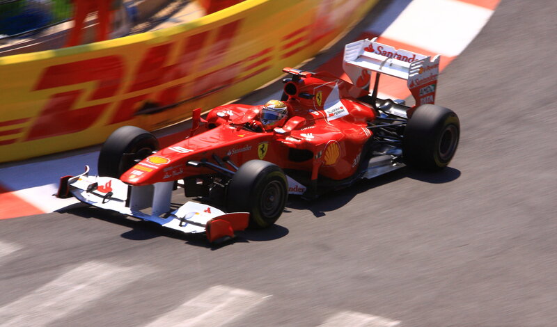 Red Formula One Car — Dynamic, Afternoon, Photograph, Driver, Track, Santander Logo
