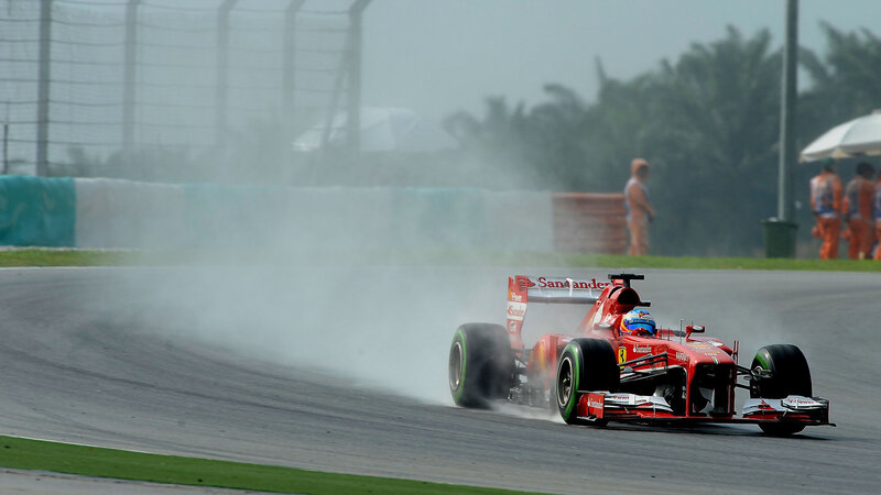 Red Formula One Car — Dynamic, Afternoon, Photograph, Driver, Track, Spectators, Umbrella