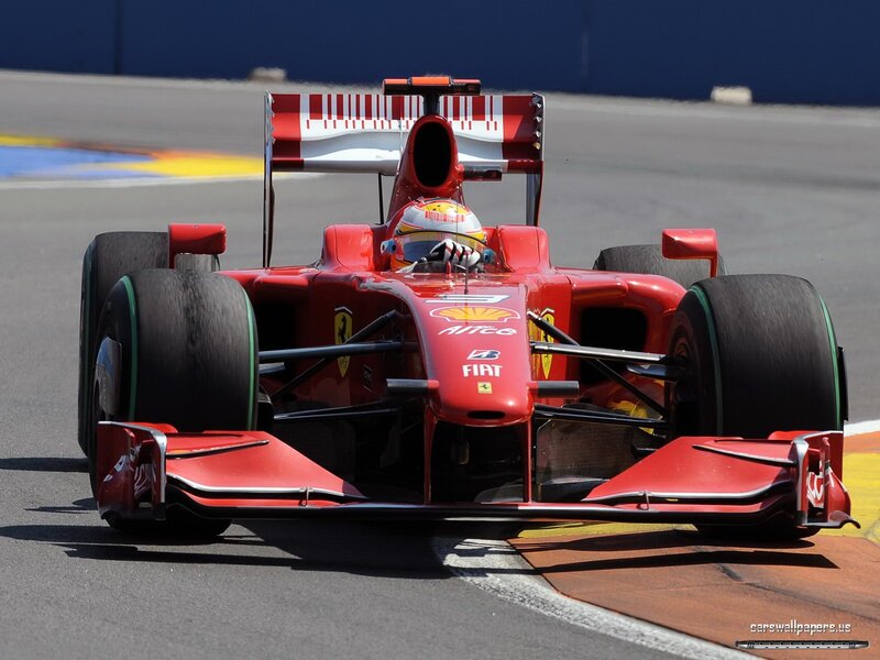 Red Formula One Car — Dynamic, Afternoon, Photograph, Driver, Track, Tires