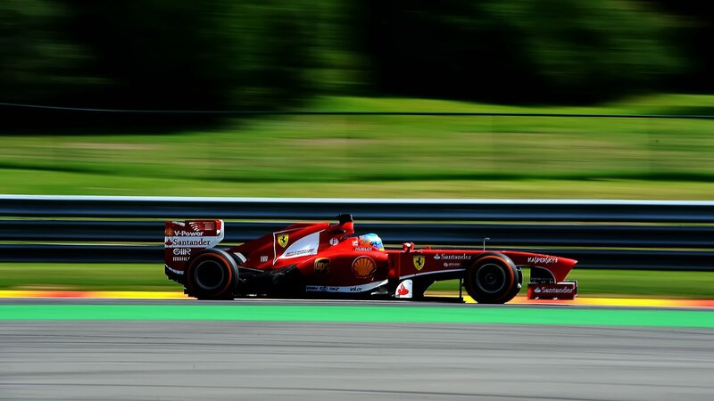Red Formula One Car — Dynamic, Afternoon, Photograph, Driver, Track, Trees