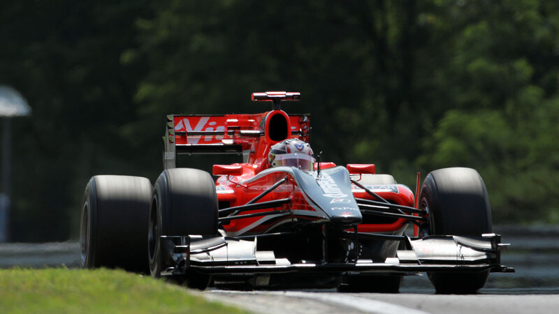 Red Formula One Car — Dynamic, Afternoon, Photograph, Driver, Trees, Grass