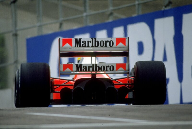 Red Formula One Car — Dynamic, Afternoon, Photograph, Marlboro Logo