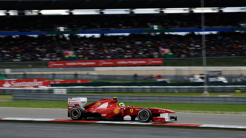 Red Formula One Car — Dynamic, Afternoon, Photograph, Race Track, Crowd