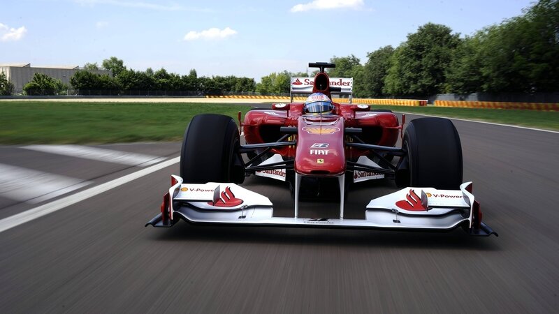 Red Formula One Car — Dynamic, Afternoon, Photograph, Race Track, Driver, Trees