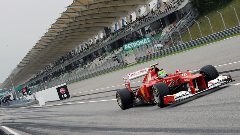 Red Formula One Car — Dynamic, Afternoon, Photograph, Race Track, Grandstand