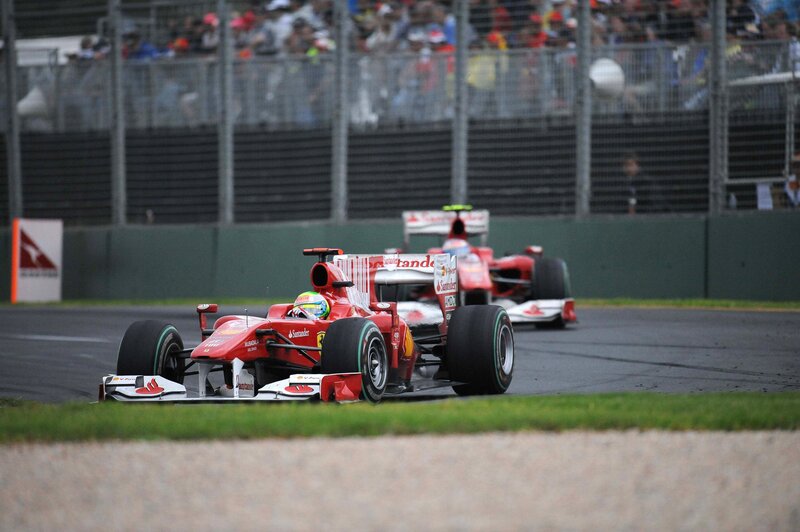 Red Formula One Car — Dynamic, Afternoon, Photograph, Race Track, Spectators