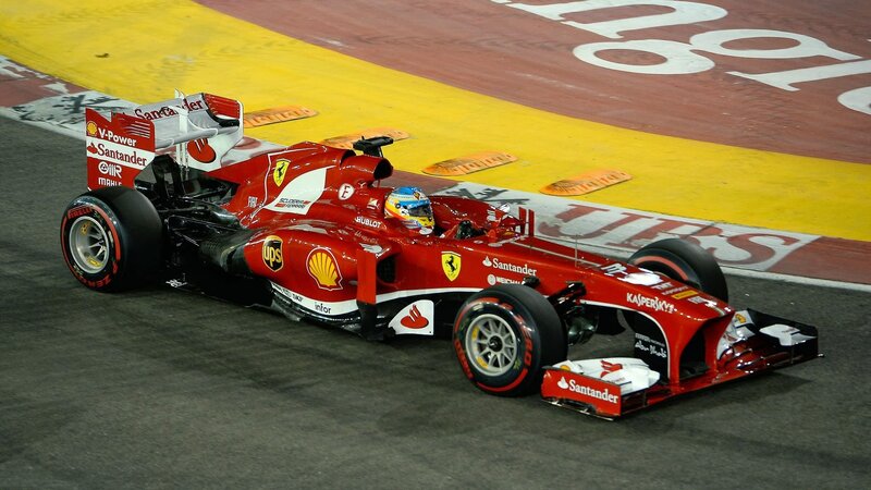 Red Formula One Car — Dynamic, Night, Photograph, Driver, Race Track, Santander Logo, Shell Logo