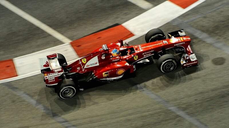 Red Formula One Car — Dynamic, Night, Photograph, Driver, Race Track, Santander Logo