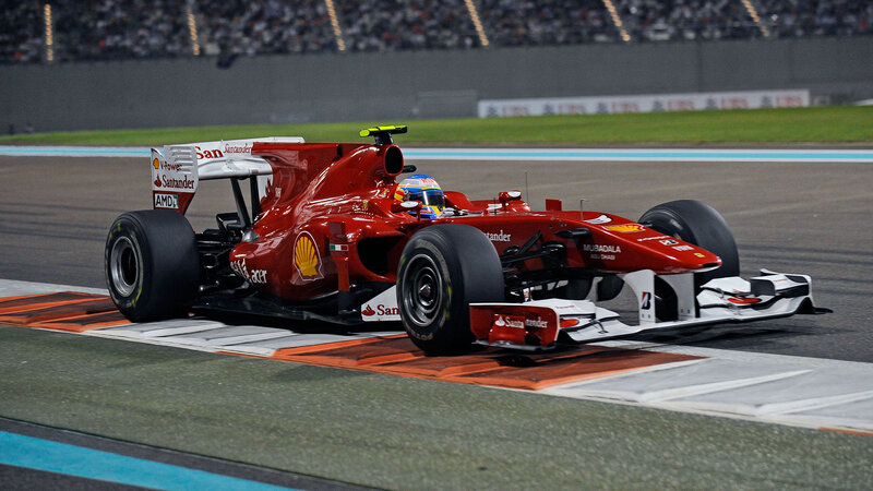 Red Formula One Car — Dynamic, Night, Photograph, Driver, Racetrack