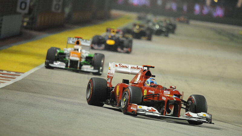 Red Formula One Car — Dynamic, Night, Photograph, Race Track
