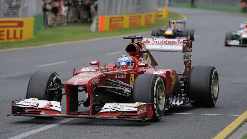 Red Formula One Car — Dynamic, Photograph, Driver, Race Track, Other Cars