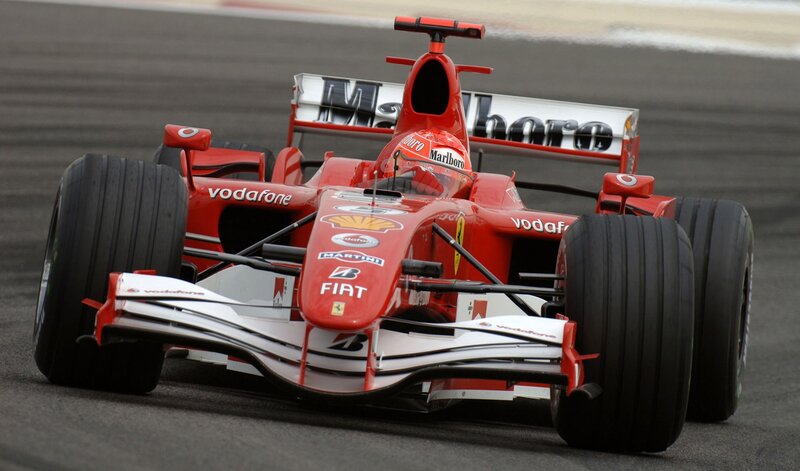 Red Formula One Car — Dynamic, Photograph, Driver, Race Track, Sponsors